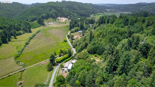 93777 Green Acres Ln, Coos Bay, OR 97420 - aerial view of property and surrounding area with a heavily wooded area and mountains