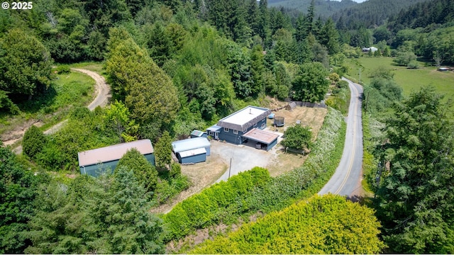 93777 Green Acres Ln, Coos Bay, OR 97420 - view from above of property featuring a heavily wooded area