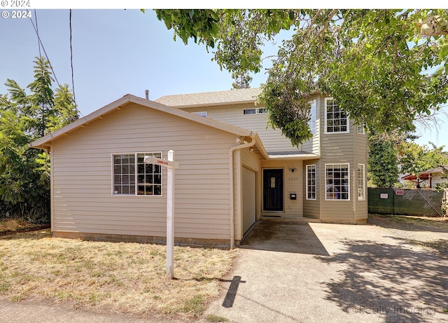 view of front of property featuring a garage