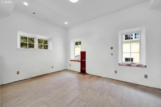 spare room featuring recessed lighting