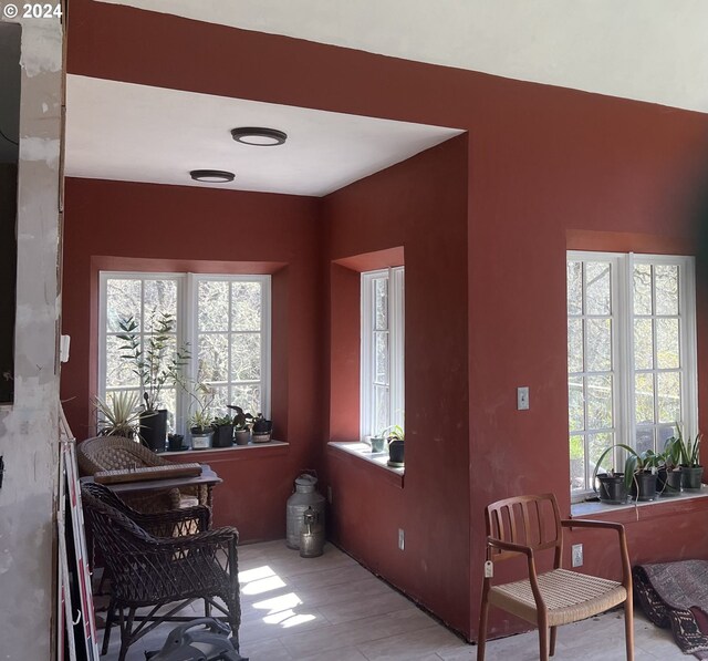 interior space with plenty of natural light and light hardwood / wood-style floors