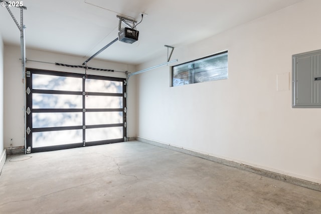 garage with electric panel and a garage door opener