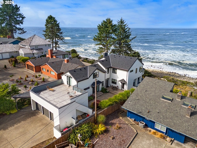 aerial view with a beach view and a water view