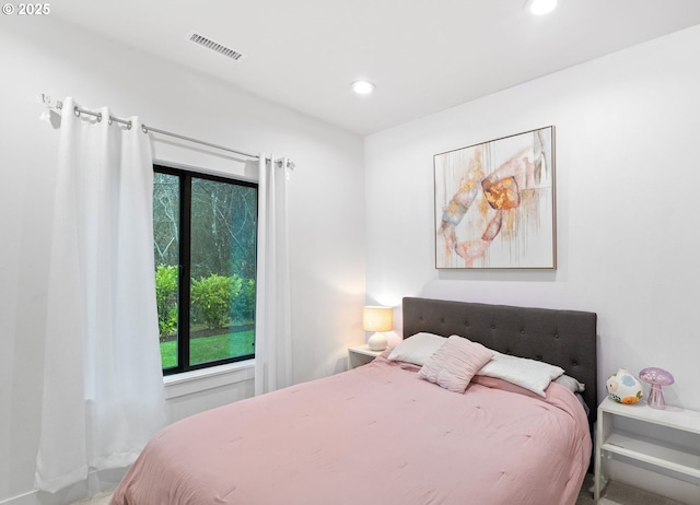 bedroom with recessed lighting and visible vents