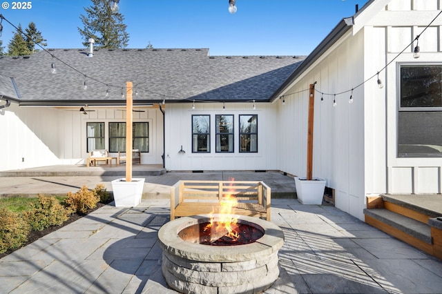 view of patio / terrace featuring an outdoor fire pit