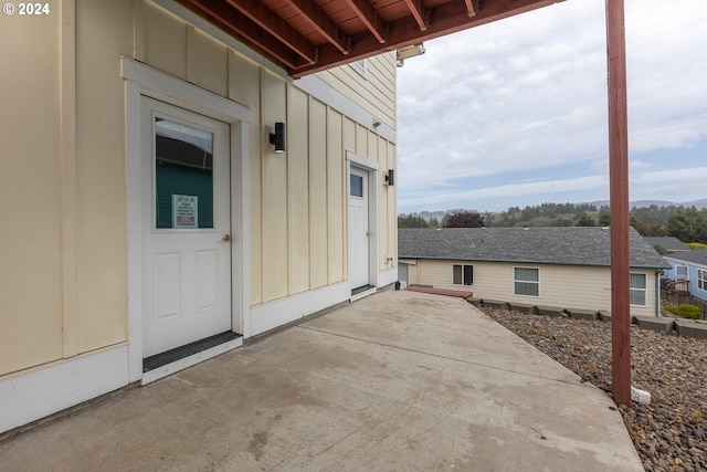 entrance to property with a patio