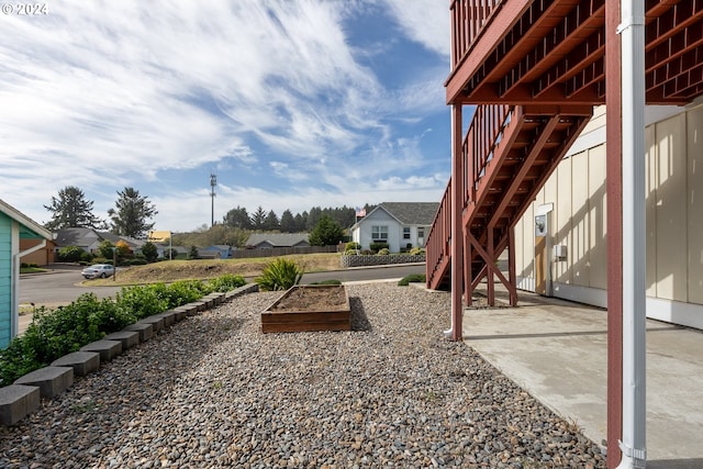 view of yard with a patio and a deck