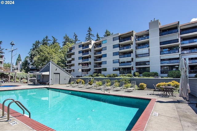 view of pool featuring a patio area