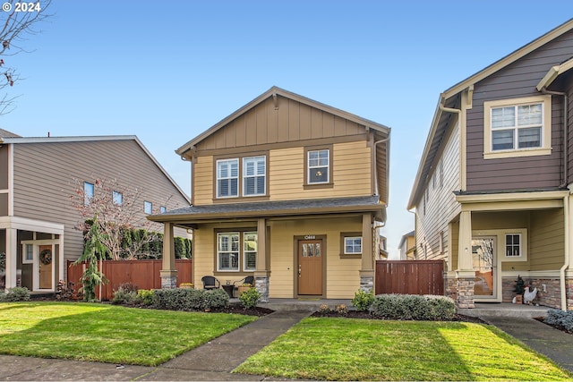 craftsman house with a front yard