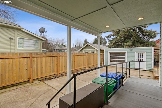 view of patio / terrace featuring an outbuilding