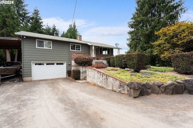 view of front of property featuring a garage