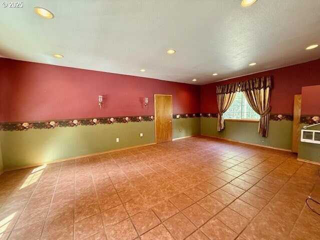 94504 Smokey Ln, Coquille, OR 97423 - spare room with baseboards and recessed lighting