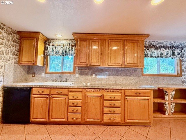 94504 Smokey Ln, Coquille, OR 97423 - kitchen with a healthy amount of sunlight, dishwasher, light countertops, and light tile patterned floors
