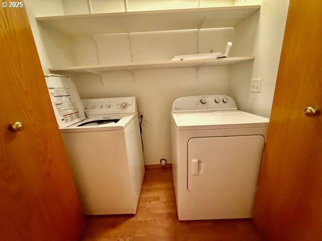 94504 Smokey Ln, Coquille, OR 97423 - laundry room with washer and clothes dryer, laundry area, and wood finished floors