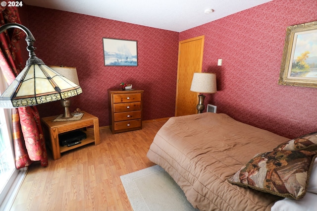 bedroom featuring light hardwood / wood-style flooring