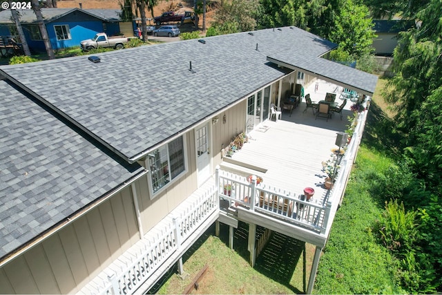 94504 Smokey Ln, Coquille, OR 97423 - back of property with roof with shingles, a deck, and outdoor dining area