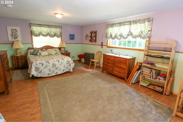 bedroom featuring wood-type flooring