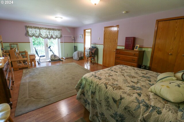 bedroom featuring wood-type flooring