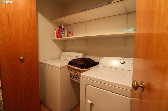 washroom with washing machine and dryer