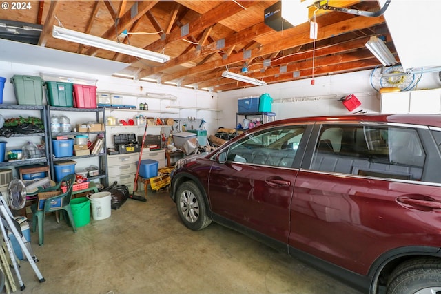 garage featuring a garage door opener