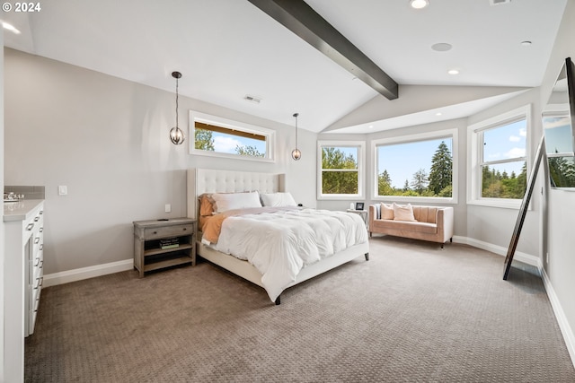 carpeted bedroom featuring lofted ceiling with beams