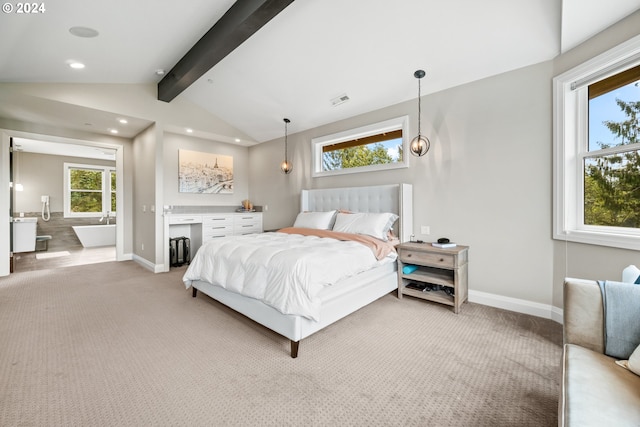 carpeted bedroom featuring lofted ceiling with beams