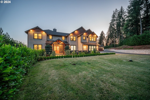 view of front of house featuring a yard