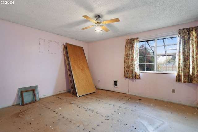 565 W Airway Rd, Lebanon, OR 97355 - spare room with a textured ceiling and ceiling fan
