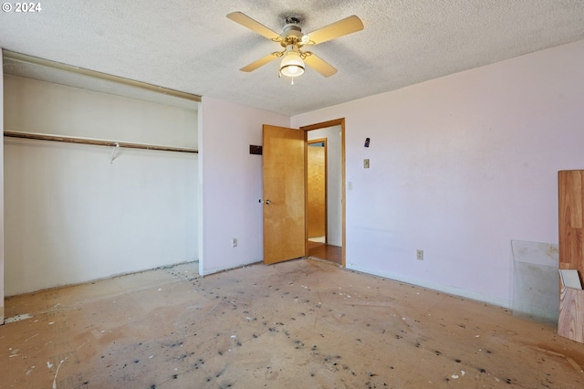 565 W Airway Rd, Lebanon, OR 97355 - unfurnished bedroom with a textured ceiling, ceiling fan, and a closet