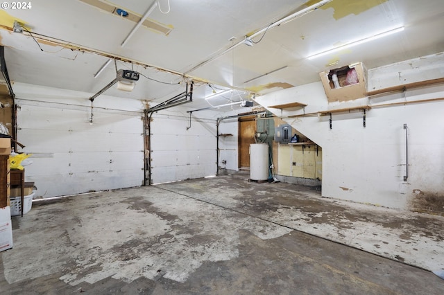 565 W Airway Rd, Lebanon, OR 97355 - garage featuring water heater and a garage door opener