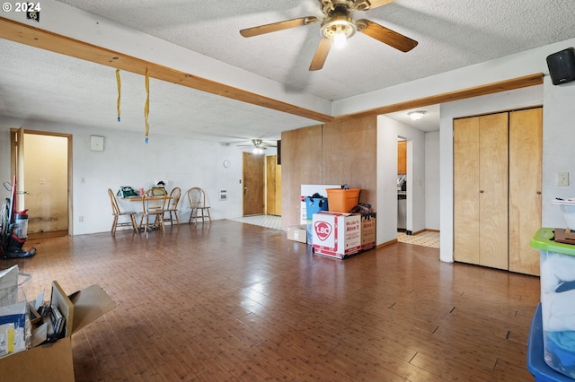 565 W Airway Rd, Lebanon, OR 97355 - living room featuring a ceiling fan, a textured ceiling, and wood finished floors