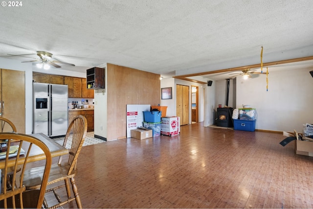 565 W Airway Rd, Lebanon, OR 97355 - interior space featuring a textured ceiling, ceiling fan, and light floors