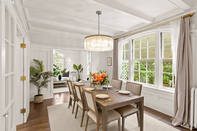 dining area featuring beam ceiling, crown molding, dark wood-type flooring, and a notable chandelier