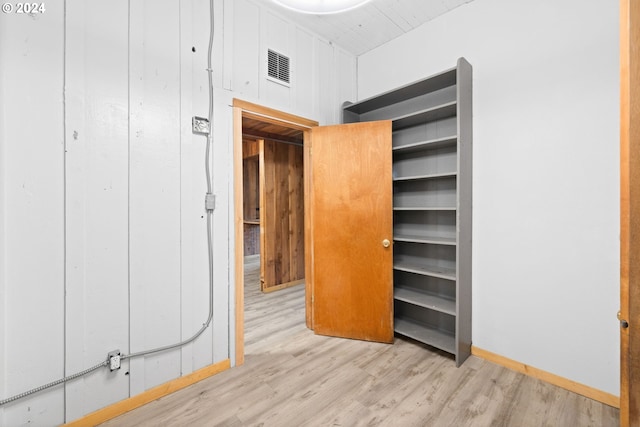 unfurnished bedroom featuring light hardwood / wood-style floors