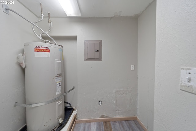 utilities with water heater and electric panel