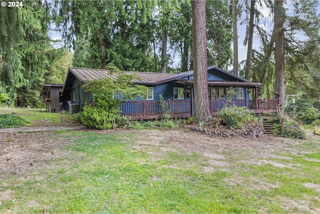 exterior space featuring a wooden deck