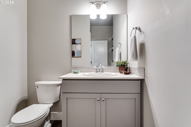 3763 Rockcress Rd, Eugene, OR 97403 - bathroom featuring tasteful backsplash, vanity, and toilet