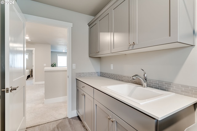 3763 Rockcress Rd, Eugene, OR 97403 - washroom featuring a sink and baseboards