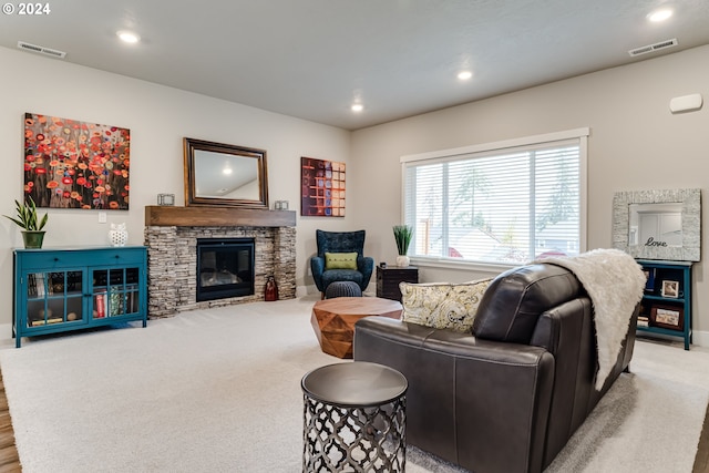 3763 Rockcress Rd, Eugene, OR 97403 - living area featuring carpet flooring, recessed lighting, a stone fireplace, and baseboards