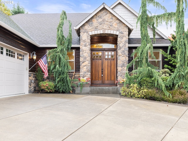 property entrance with a garage