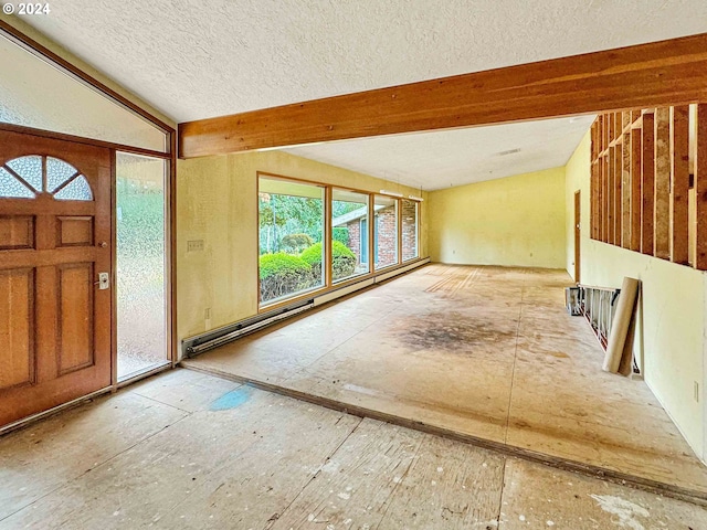 foyer with a textured ceiling