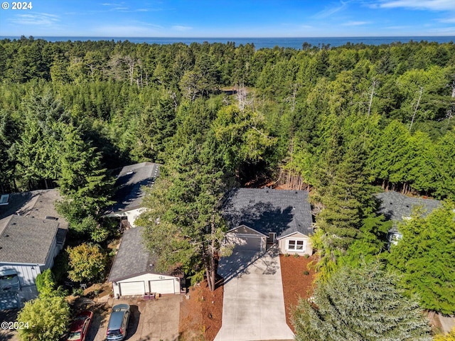 drone / aerial view with a view of trees