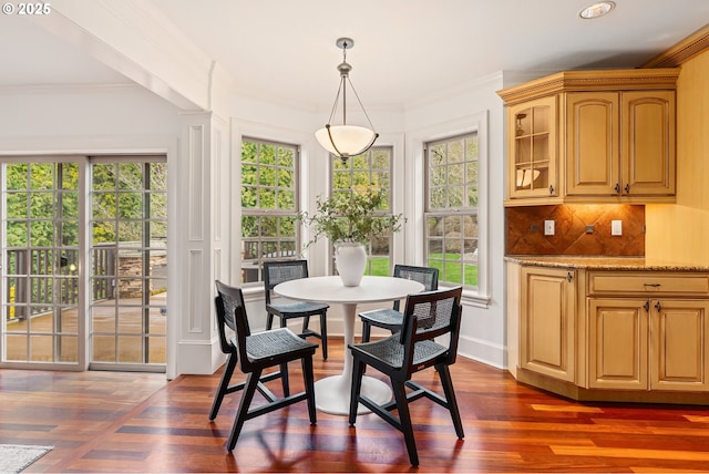 6145 SW Sweetbriar Ct, Portland, OR 97221 - dining room with crown molding and dark wood-style flooring