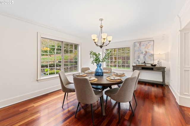 6145 SW Sweetbriar Ct, Portland, OR 97221 - dining area featuring a chandelier, healthy amount of natural light, wood finished floors, baseboards, and ornamental molding