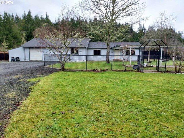 view of yard featuring a gazebo and a garage