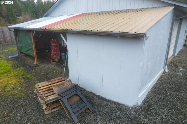 view of property exterior featuring an outdoor structure