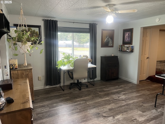 office area featuring ceiling fan, dark hardwood / wood-style floors, and a textured ceiling