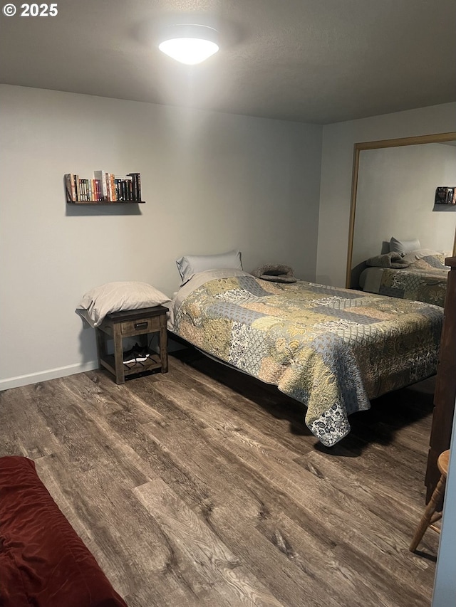 bedroom with hardwood / wood-style flooring