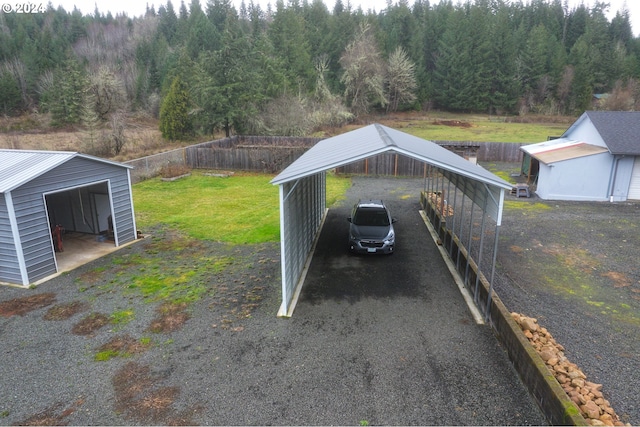 exterior space featuring a lawn and a carport