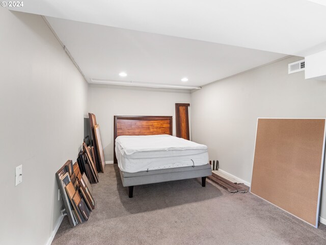 bedroom featuring carpet